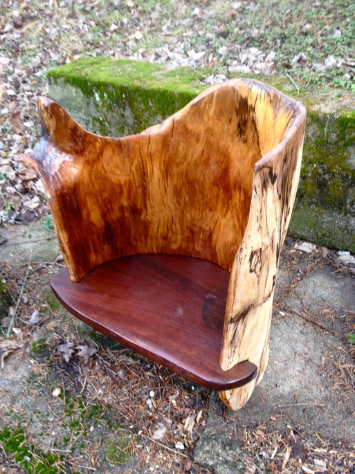 24. log chair with arm rest"  $1200, medium:Shrubbi artist: Michael Biddison